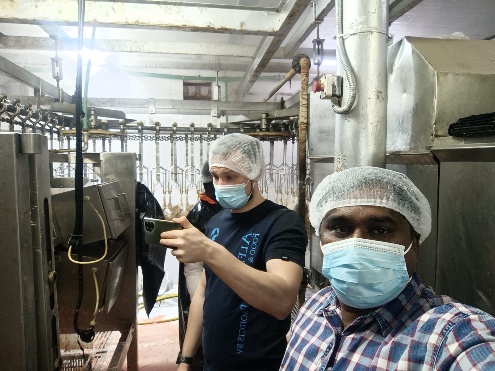 Poultry scalding and defeathering equipment in a processing plant